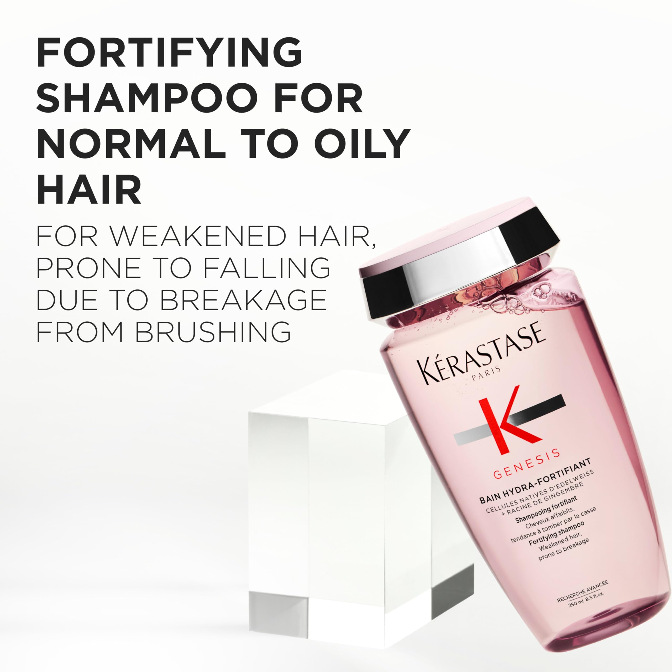 KÉRASTASE Genesis Hydra-Fortifying Shampoo pump dispensing a gentle cleanse.