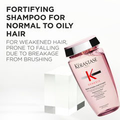 KÉRASTASE Genesis Hydra-Fortifying Shampoo pump dispensing a gentle cleanse.