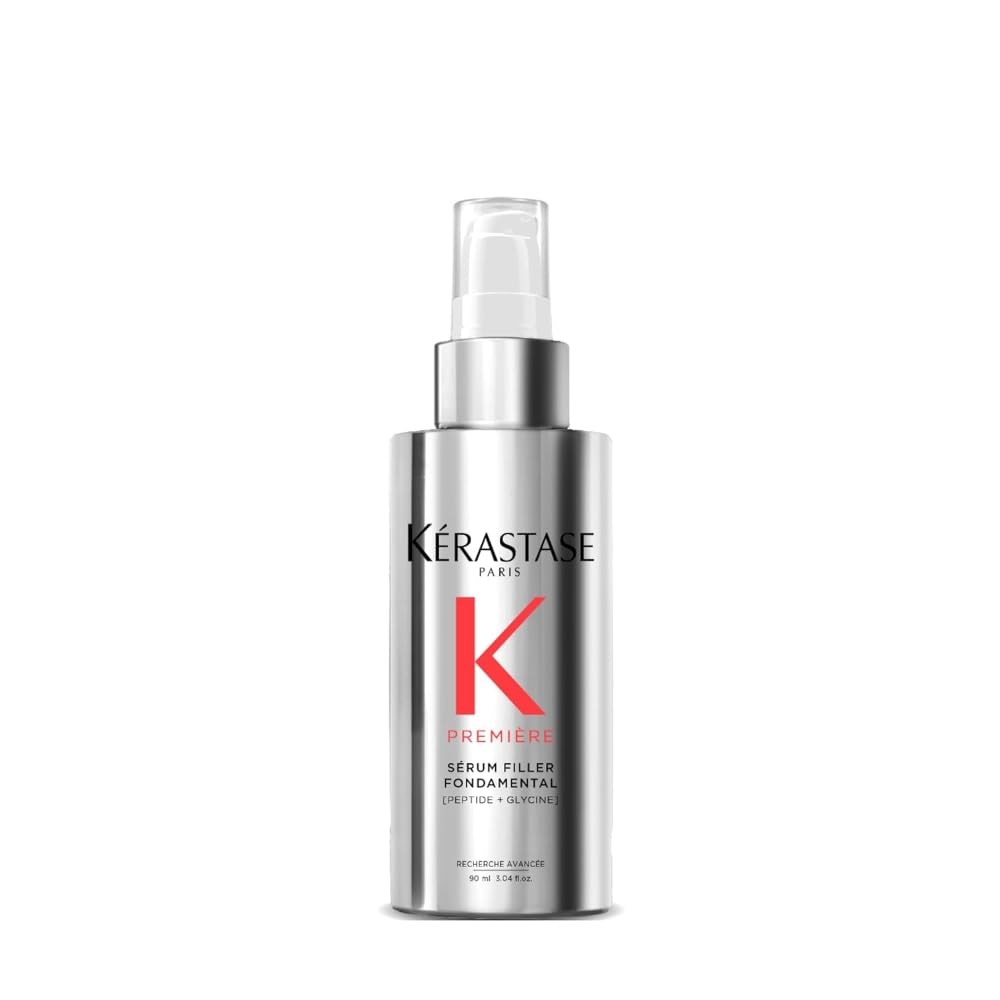 KÉRASTASE Premiere serum bottle close-up shows frizz control and heat protection