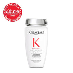 Kerastase Premiere hands apply shampoo for even distribution.
