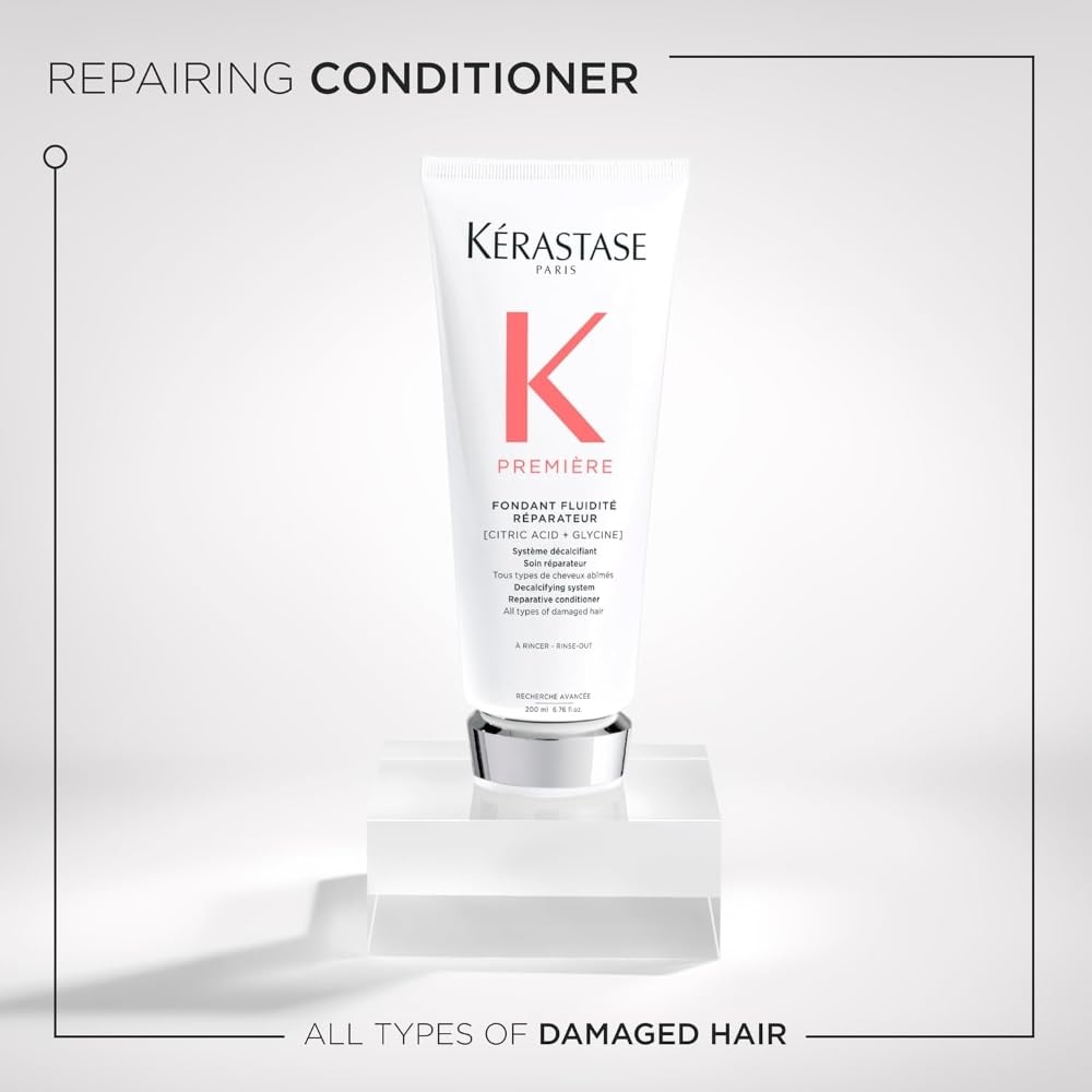 Kerastase Premiere conditioner pump closeup, ready to apply for instant hydration
