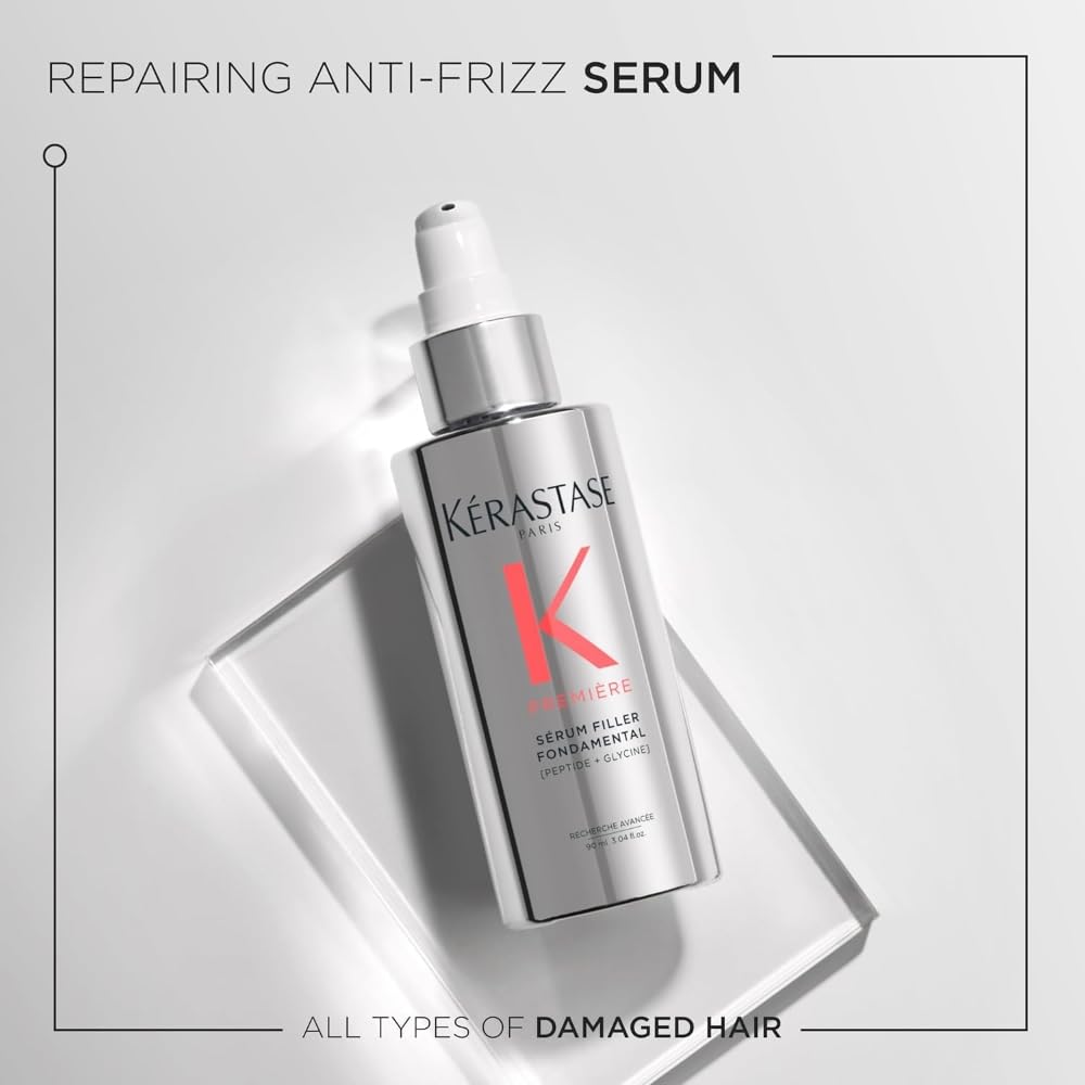 Kerastase Premiere serum drop on palm demonstrates targeted application for smooth, strong hair