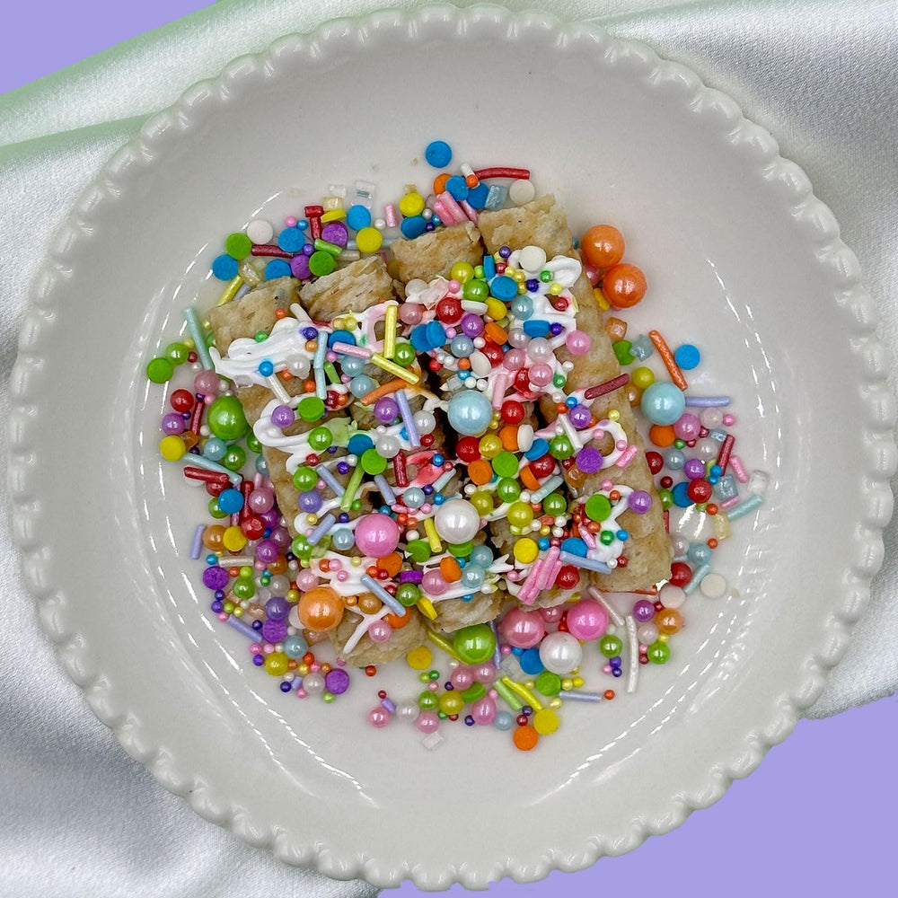 Kercky Rainbow Sprinkles on brownies and cupcakes in a cheerful setup