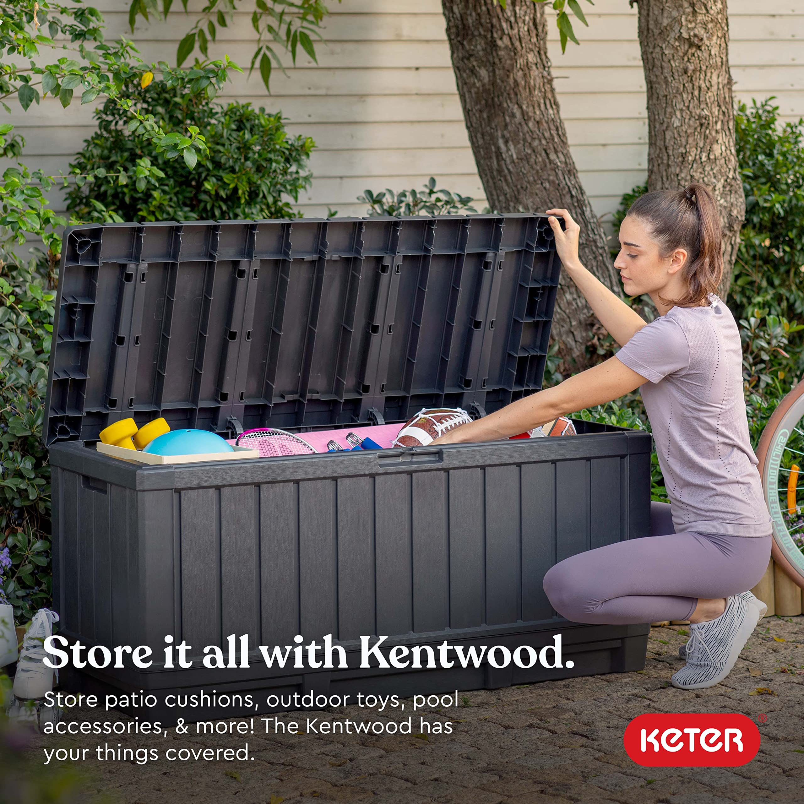 Keter Kentwood 92G deck box on patio provides practical seating and organized gear.