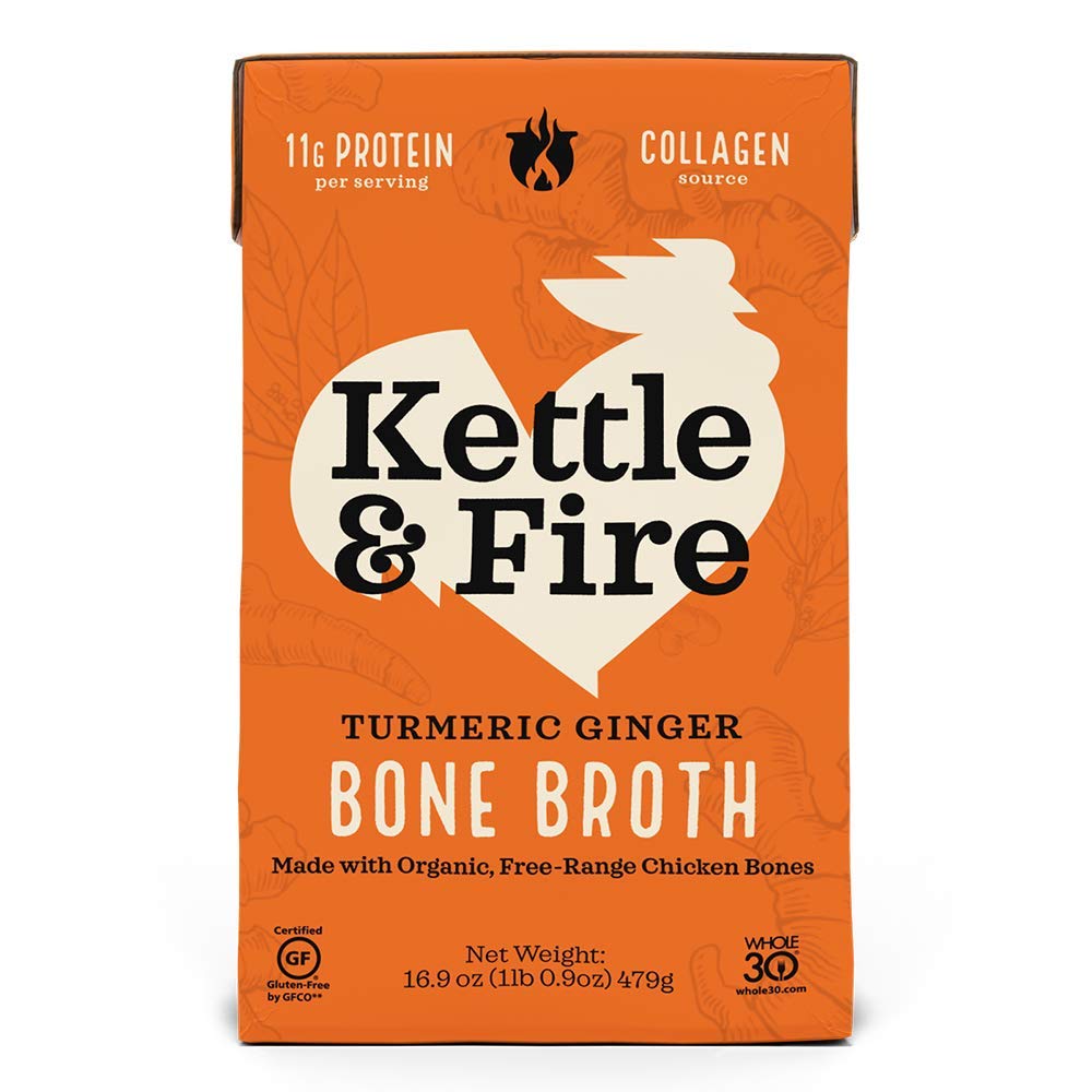 Kettle & Fire chicken turmeric ginger broth bottle pour for comforting warmth.