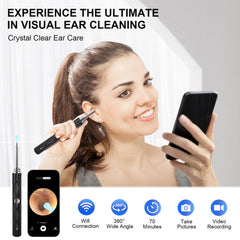 Rotatable ear spoon with silicone tips protects delicate skin during cleaning.