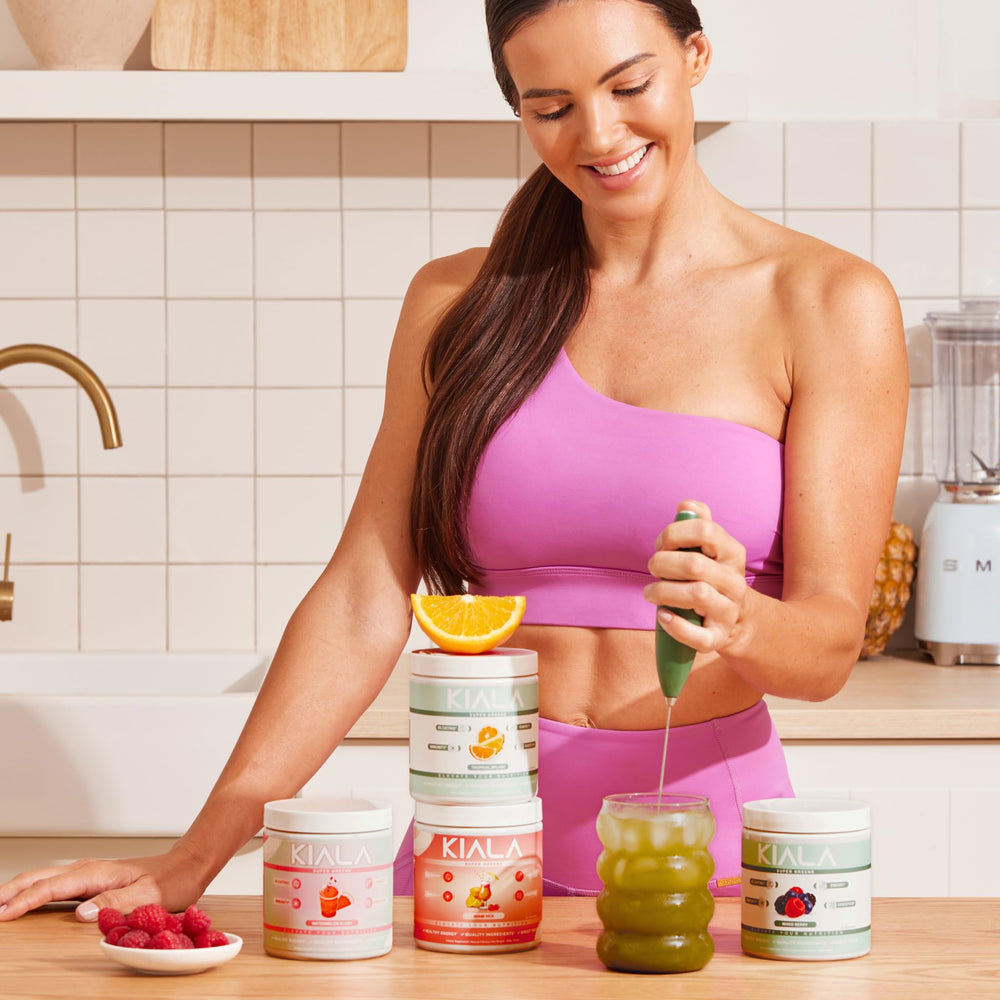 Glass with shaken Kiala Super Greens for an energy-boosting morning