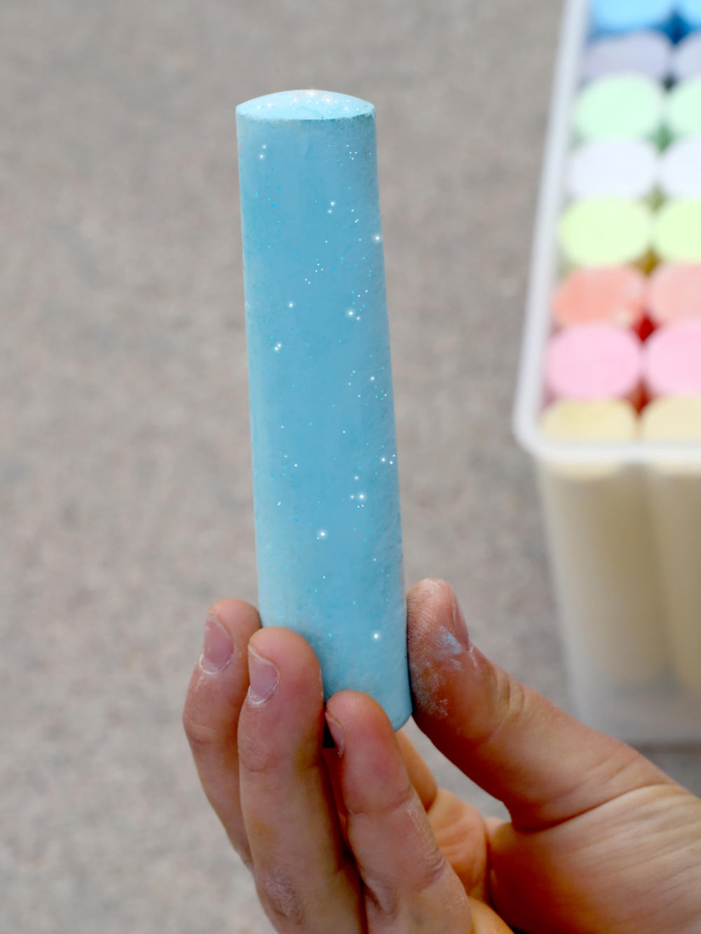 Kid Made Modern 60-piece sidewalk chalk variety pack—three chalk types: neon, glitter, regular.
