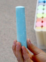Kid Made Modern 60-piece sidewalk chalk variety pack—three chalk types: neon, glitter, regular.