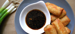 Kikkoman Lite Soy Sauce pour shot for versatile cooking.