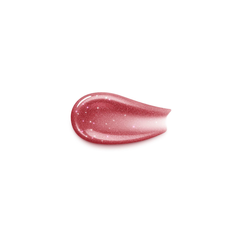 Kiko Milano lip gloss cap close-up with metallic finish and KK logo