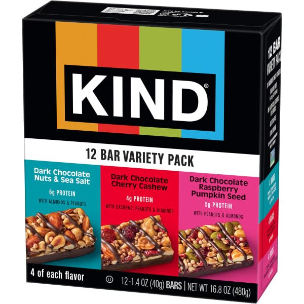KIND Dark Chocolate Raspberry Pumpkin Seed bar featuring pumpkin seeds for texture.