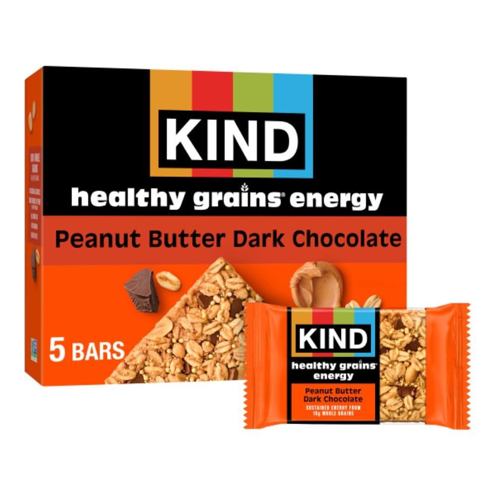 KIND Peanut Butter Dark Chocolate energy bar close-up showing whole grains.
