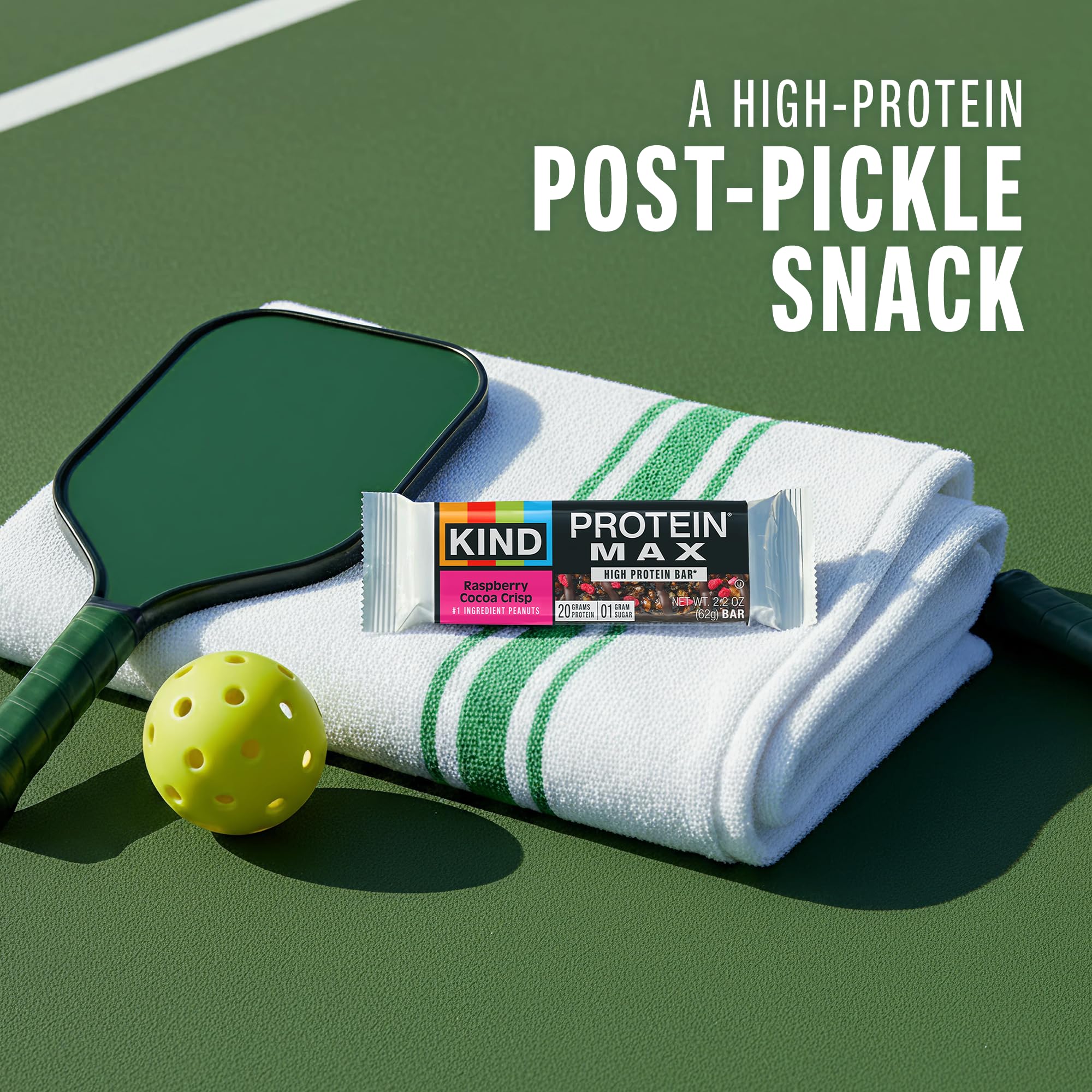 KIND Protein MAX Raspberry Cocoa Crisp bar unwrap shows ready-to-eat snack.