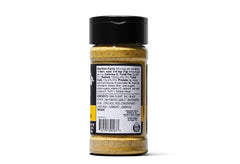 Kinder's Organic Cracked Pepper and Lemon seasoning in a marinade bowl enhances seafood flavor.