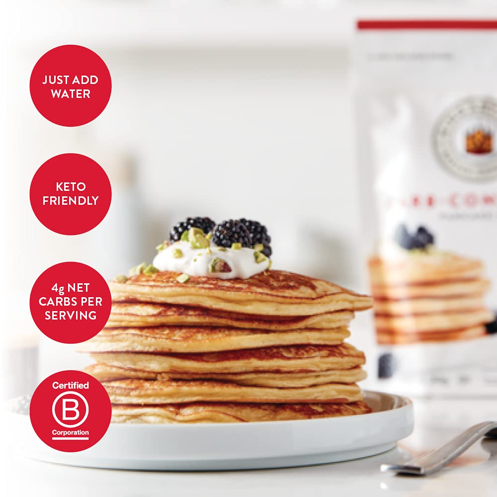 King Arthur Keto Wheat Pancake Mix fluffy pancakes on plate with light texture.