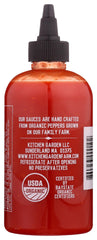 Kitchen and Garden Organic Sriracha ingredients reveal peppers and garlic for vibrant flavor.