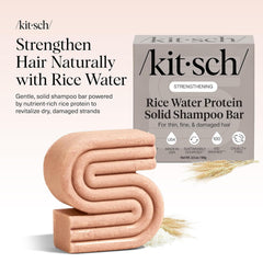 Kitsch rice water shampoo bar held in hand for mess-free application