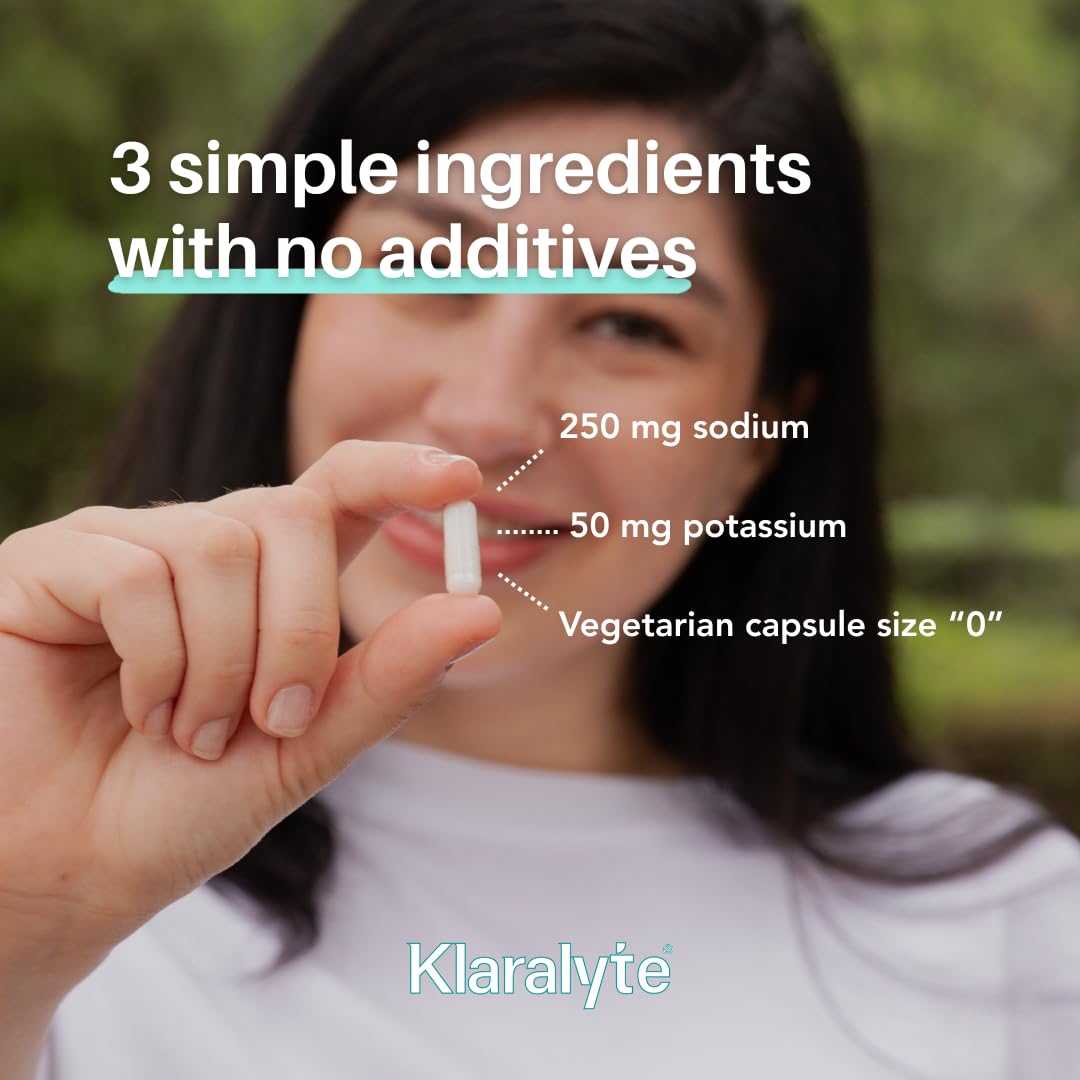 Klaralyte capsules in hand illustrate easy on-the-go hydration.