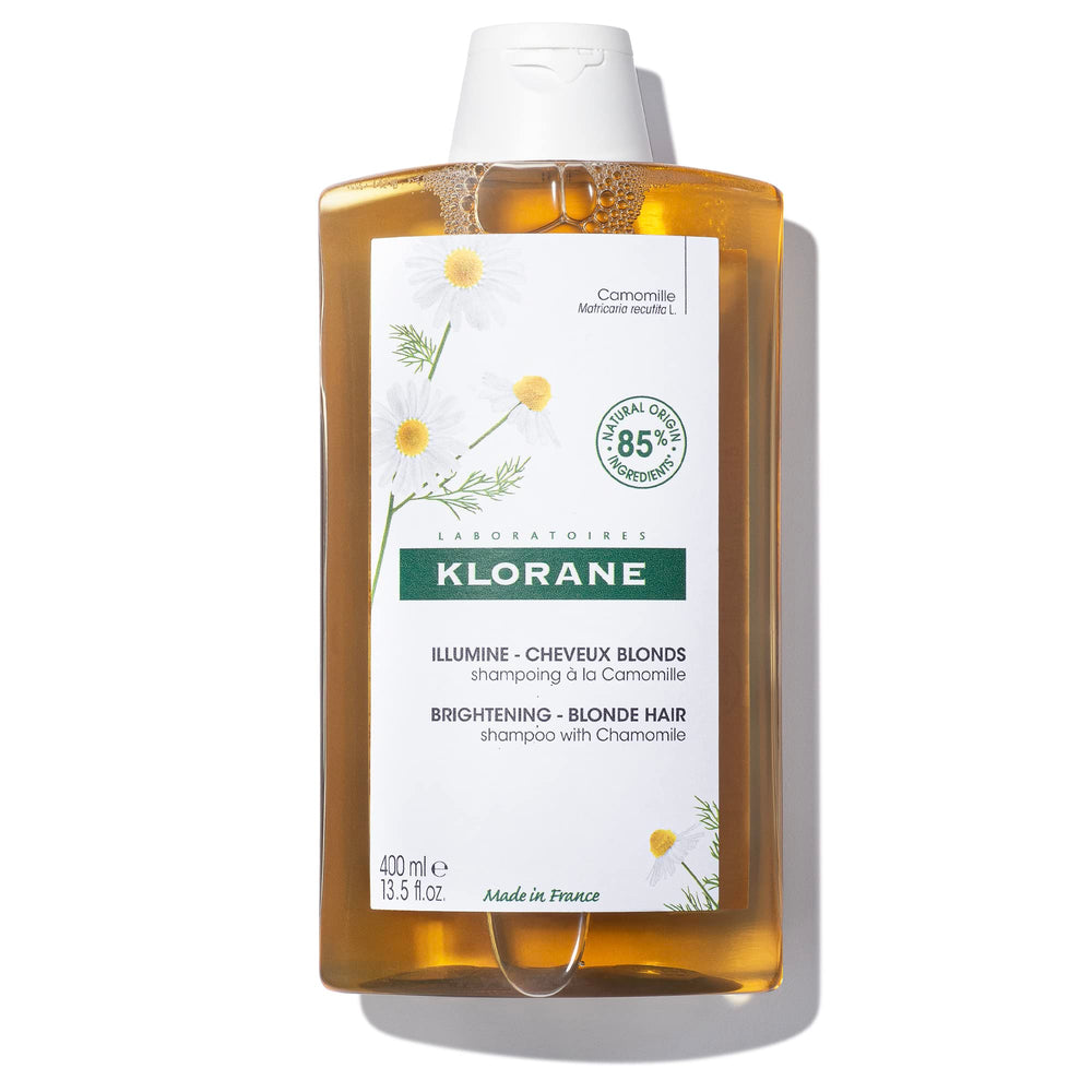 Klorane Brightening Shampoo with Chamomile bottle adds luminous shine to blonde hair.