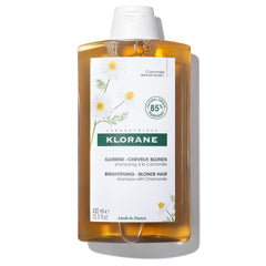 Klorane Brightening Shampoo with Chamomile bottle adds luminous shine to blonde hair.