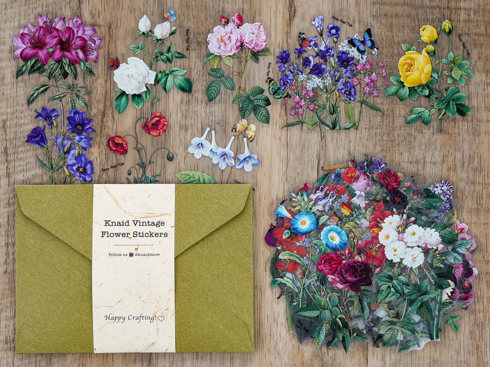 Knaid floral decals on laptop and paper surfaces for bright accents.