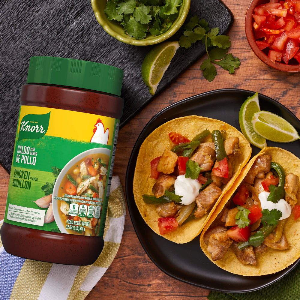 Knorr granulated chicken bouillon beside vegetables for cooking.