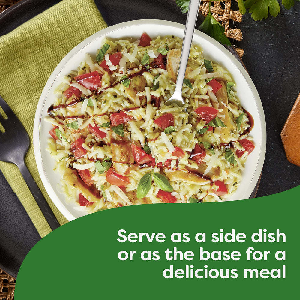 Knorr Rice Sides Creamy Chicken ingredients like onions and herbs on the counter.