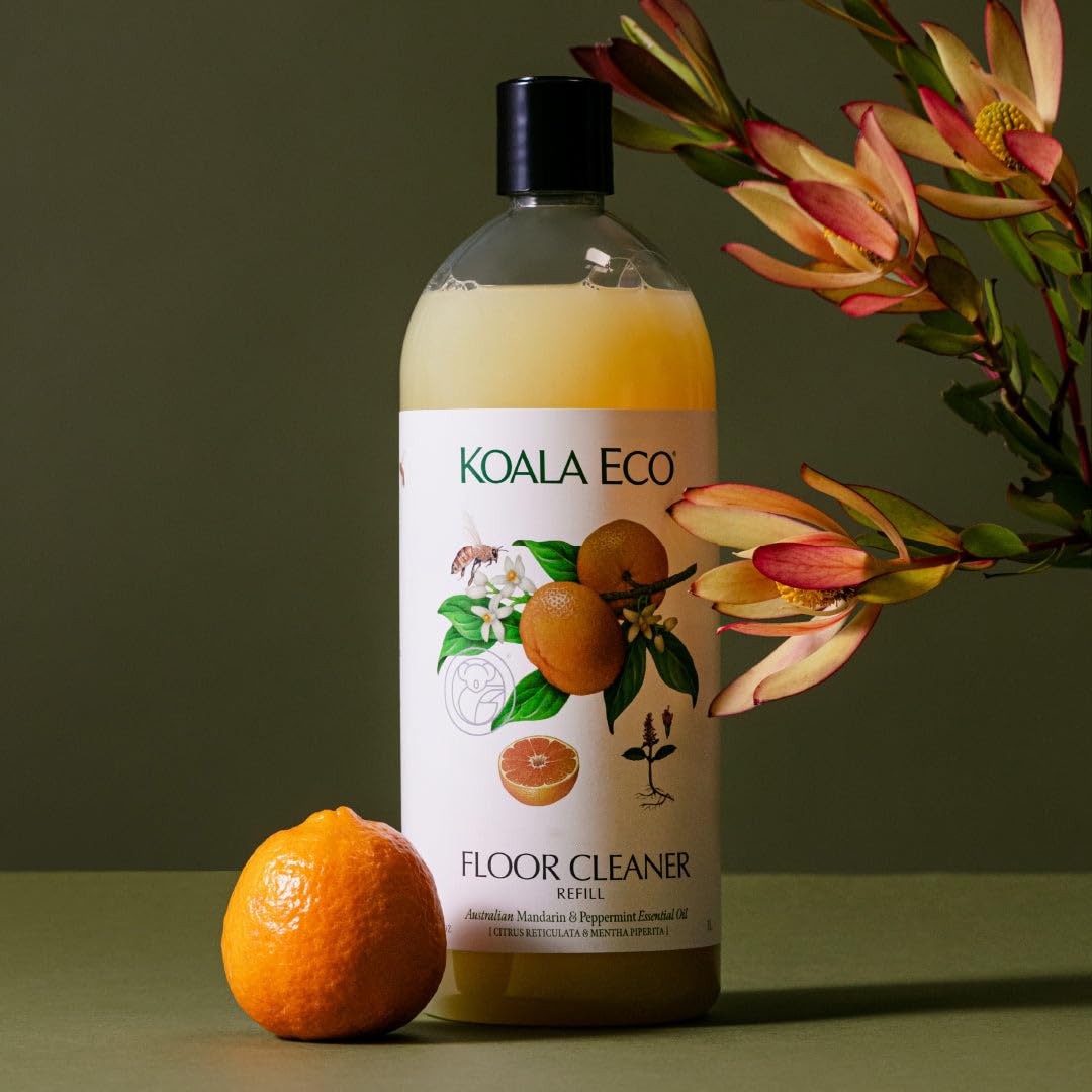 Koala Eco floor cleaner in action on a tiled floor.