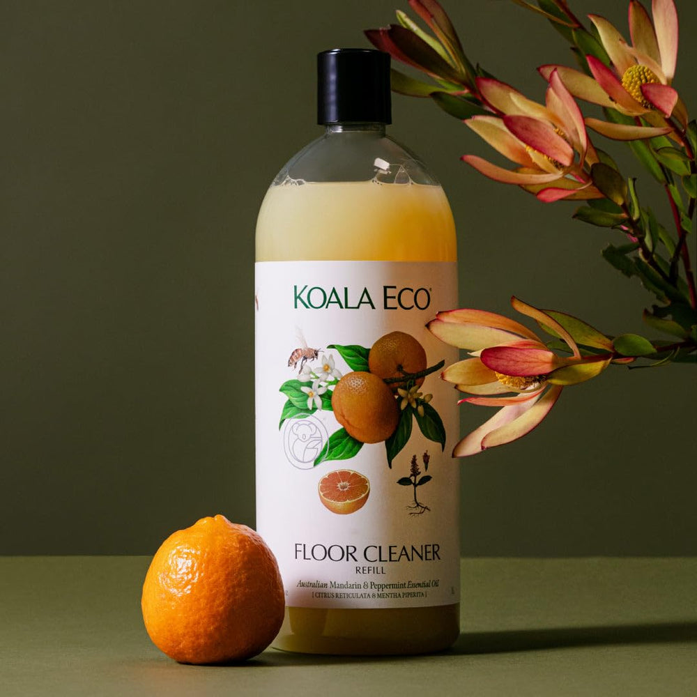 Koala Eco floor cleaner in action on a tiled floor.