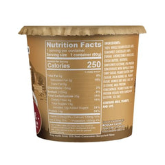 Kodiak Cakes oatmeal cup close-up with peanut butter chocolate chips, convenient protein source.