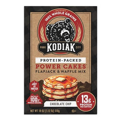 Stacked Kodiak Cakes pancakes with syrup showcasing fluffy texture and flavor.