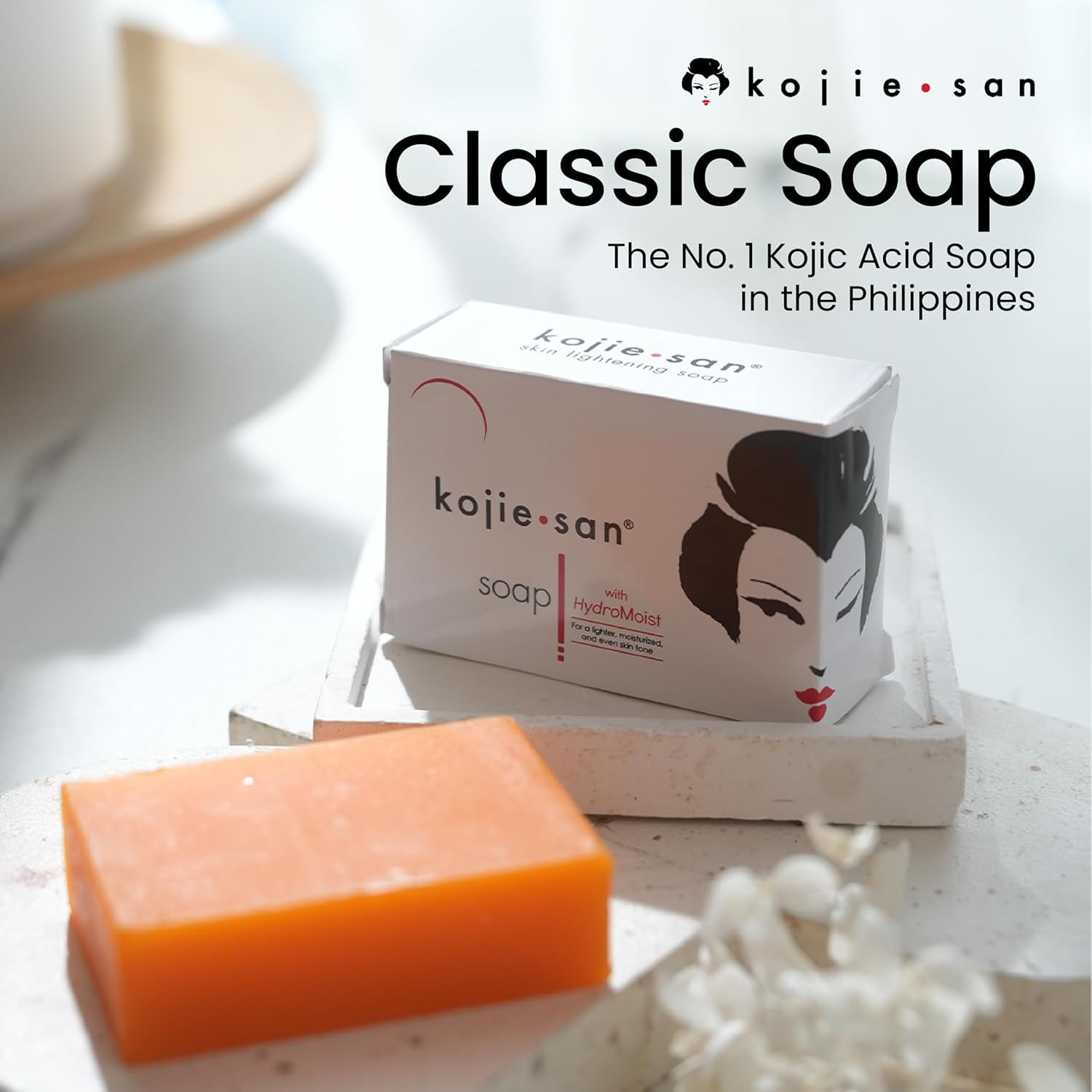 Kojie San orange-scented soap for daily refreshing use.