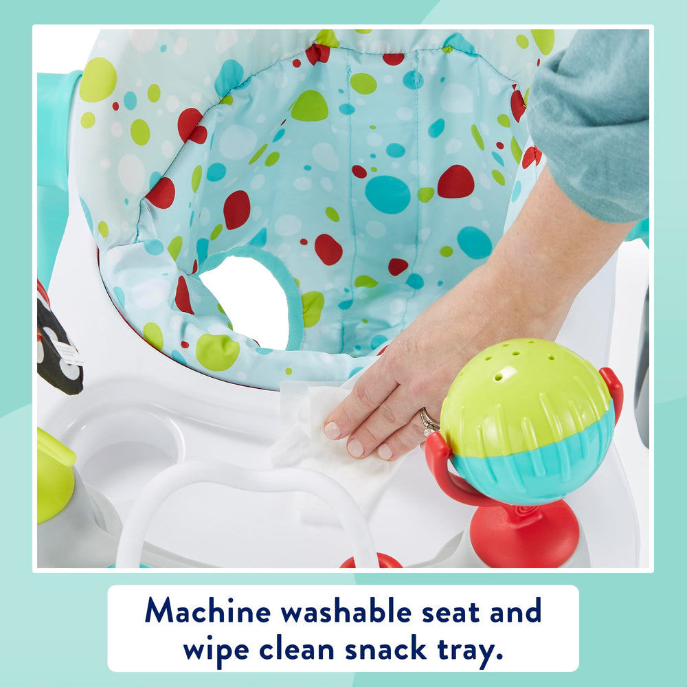 Kolcraft Tiny Steps giant spinning ball encourages dynamic hand-eye coordination.