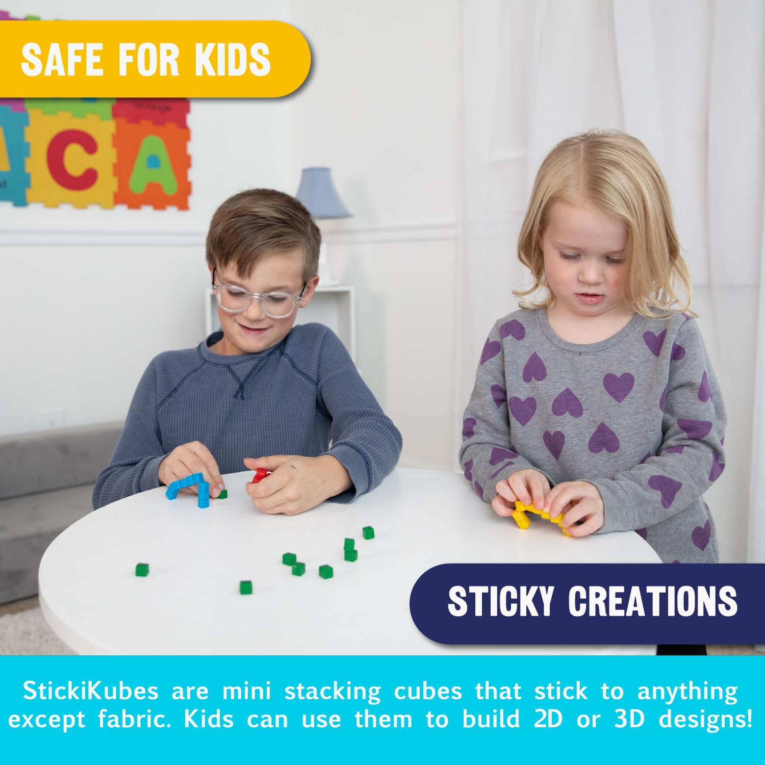 KOMARC GAMES StickiKubes enable 2D and 3D designs on walls or desks.