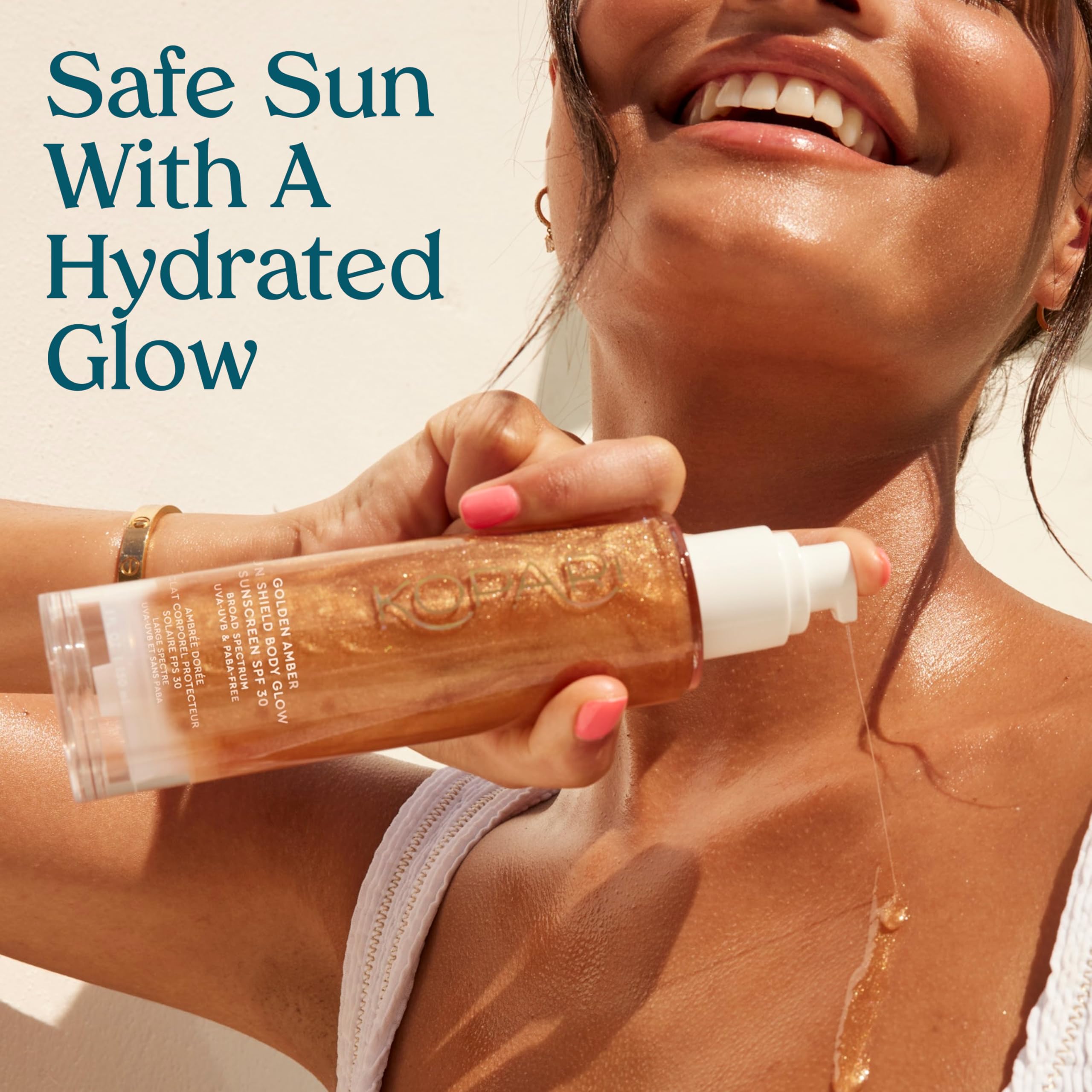 Kopari Sun Shield Body Glow being applied for an even, quick-absorbing finish.