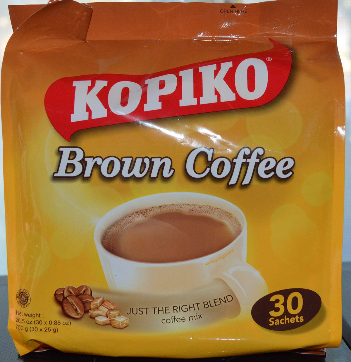 Kopiko Instant 3-in-1 coffee mix cup design offers quick creamy energy on the go