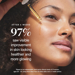 KORA Organics Noni Glow Face Oil applied on hands for facial care routine