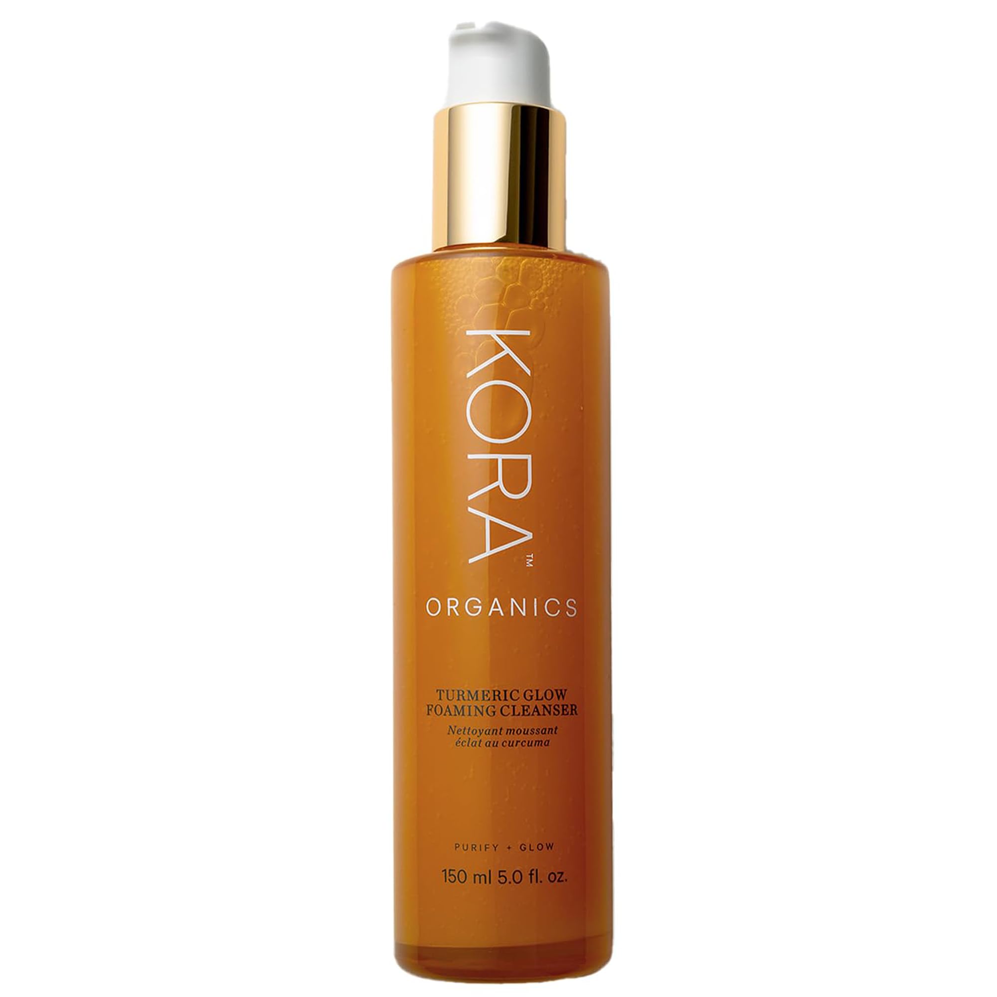 KORA Organics Turmeric Glow Foaming Cleanser bottle highlights organic formula for radiant skin.