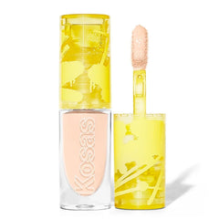 Kosas Mini Revealer Concealer tube close-up, showcasing creamy texture for seamless under-eye coverage.
