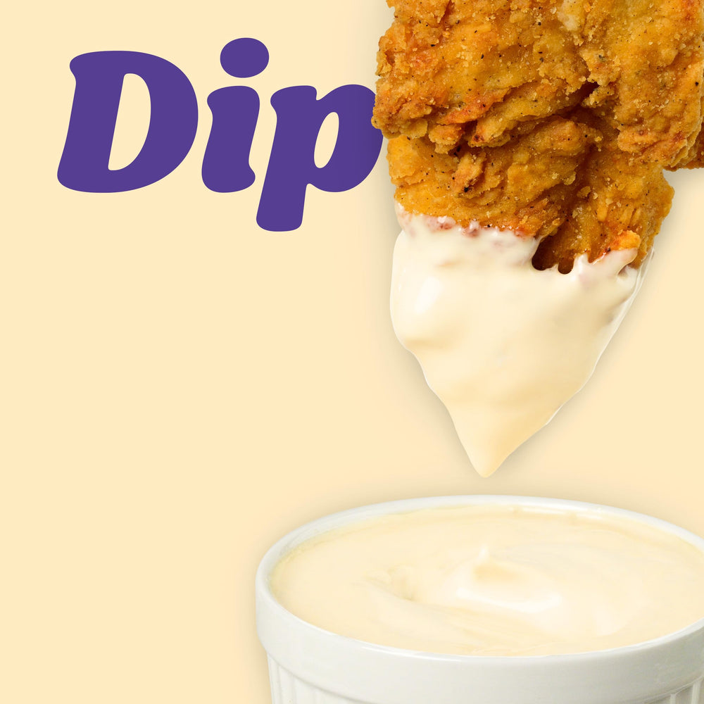 Fries dipped in Kraft Garlic Aioli for savory bite.