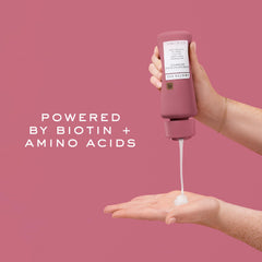Lather texture image from Kristin Ess Biotin Shampoo highlighting gentle cleansing
