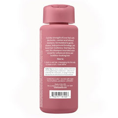 Close-up of pump-dispense on Kristin Ess Biotin Shampoo for easy daily use