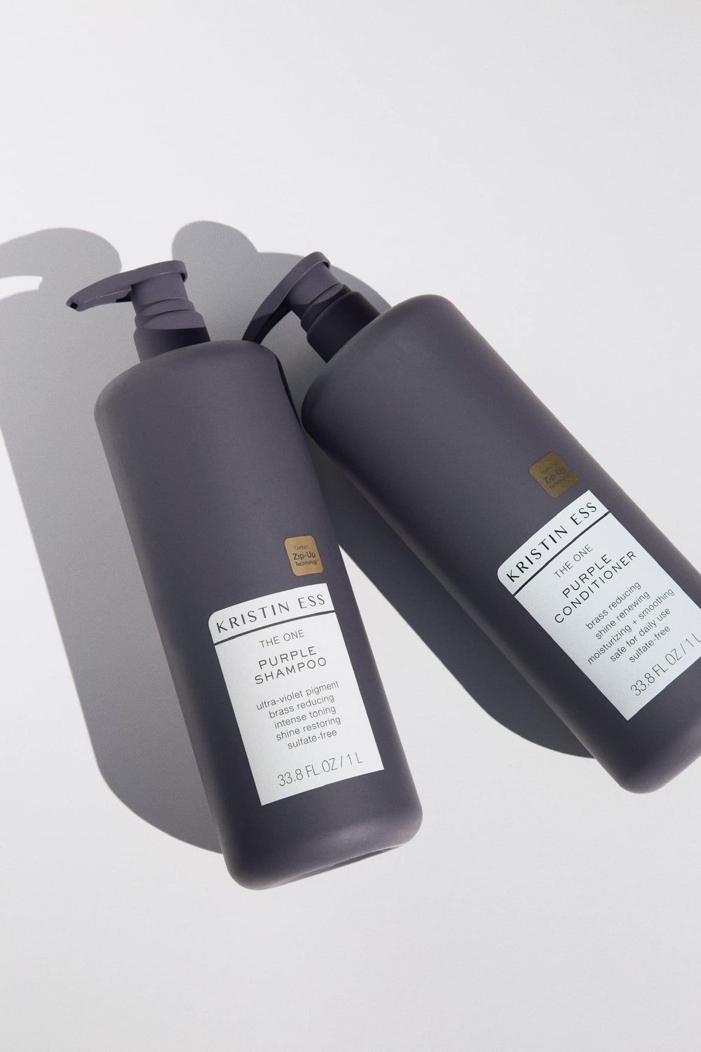 Kristin Ess Detox bottle in shower showing pump usage