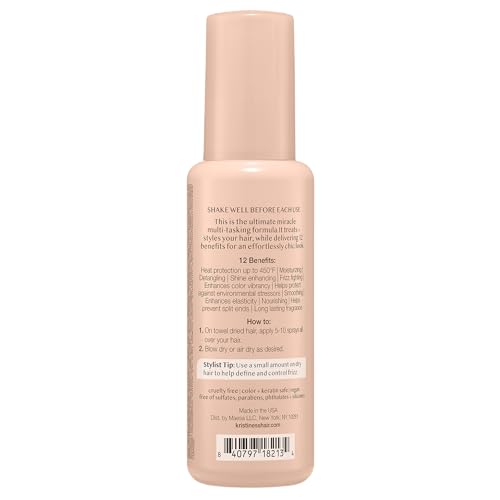 Kristin Ess leave-in spray being applied to hair during styling.