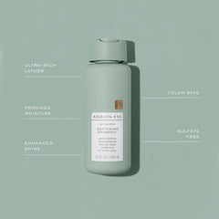 Close-up of Kristin Ess Softening Fragrance notes with coconut and lily