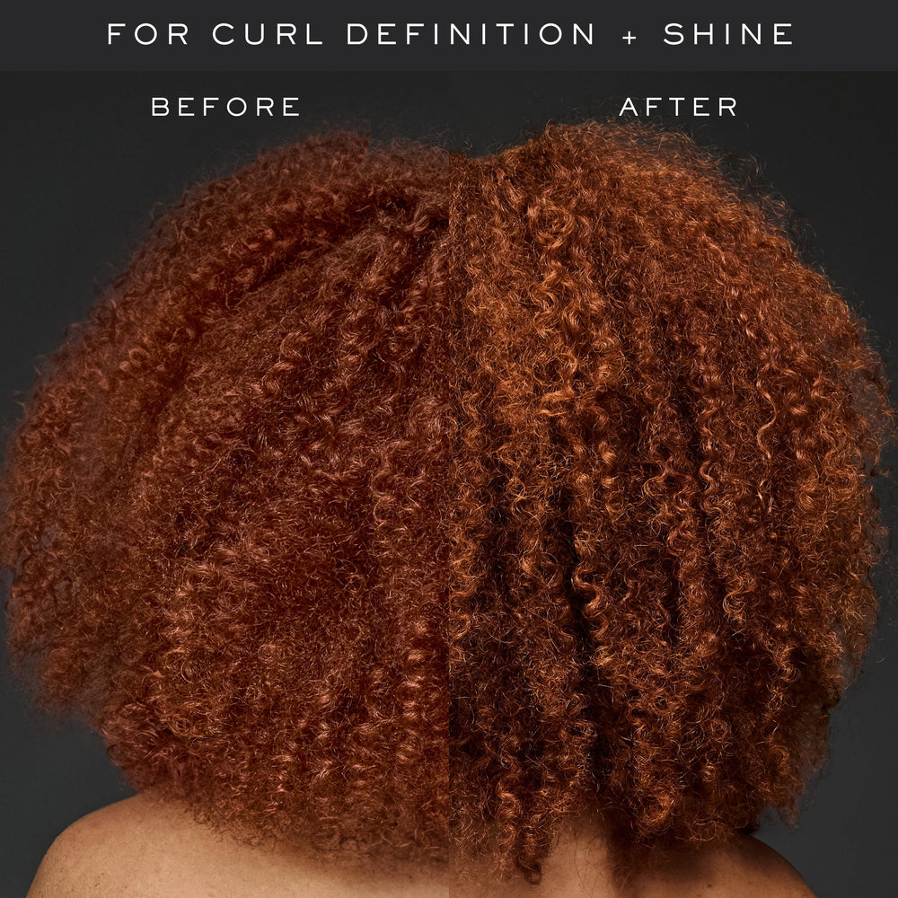 Applying curl cream on dry hair to tame frizz and add smoothness