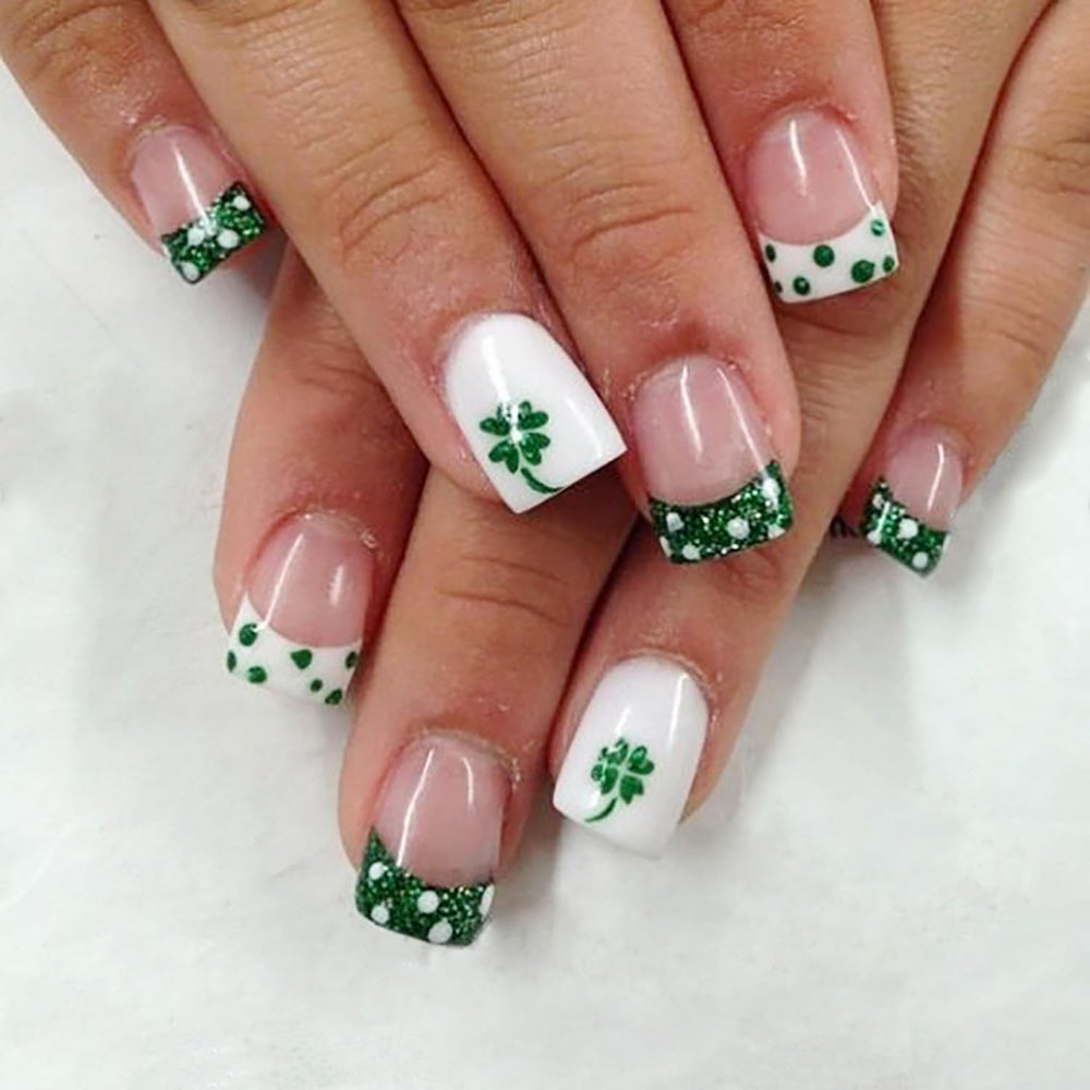 KRTBKR St Patrick's Day nails with white dots and green glitter for quick DIY glam