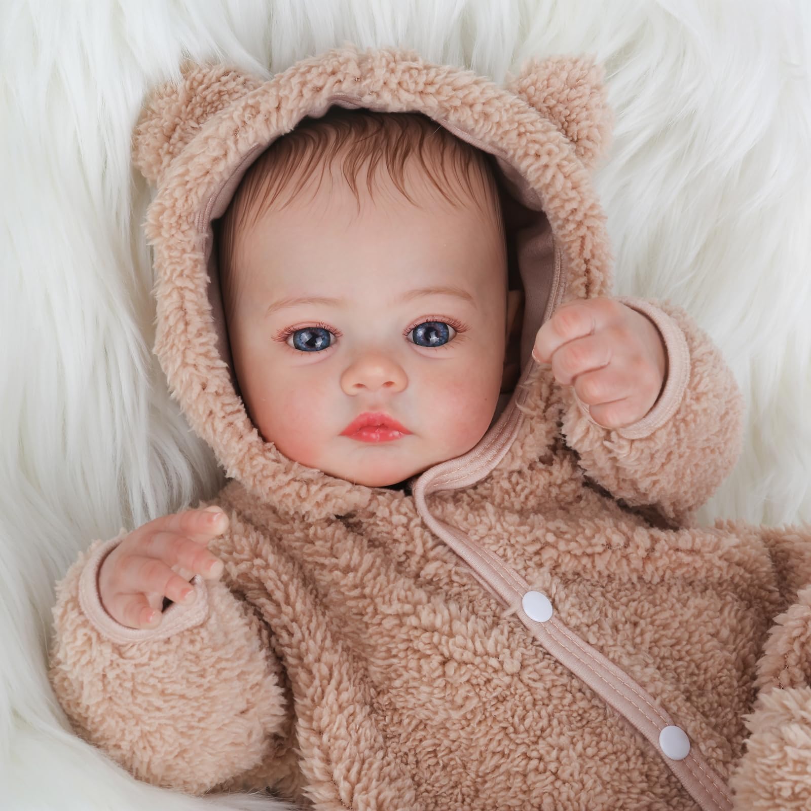 KSBD grey onesie detail highlighting newborn-like look