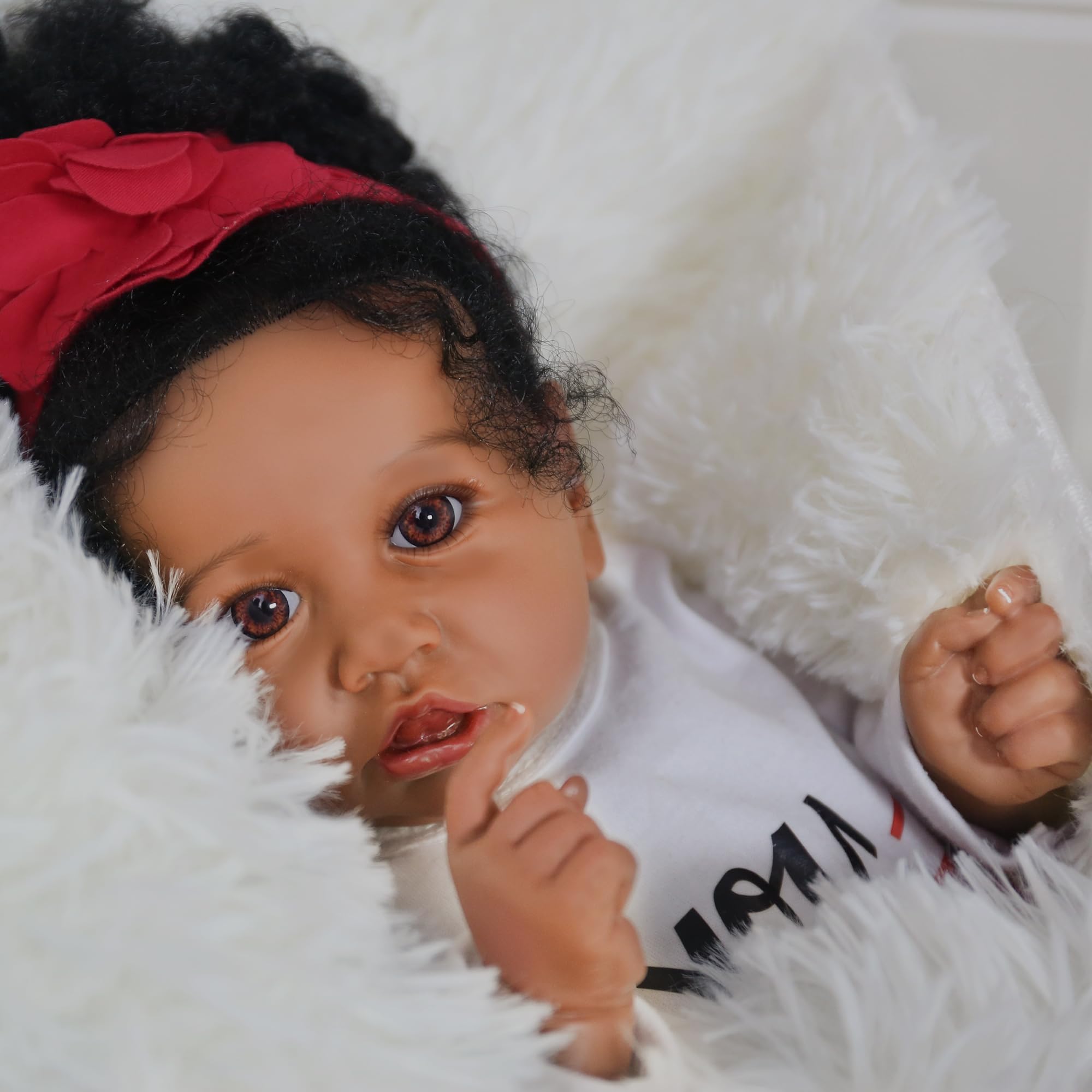 KSBD Reborn doll in suit ready for dress-up and play.
